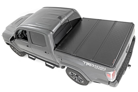 Rough Country  | Hard Folding Bed Cover | 5 Ft Bed | Toyota Tacoma 2WD/4WD (16-23)